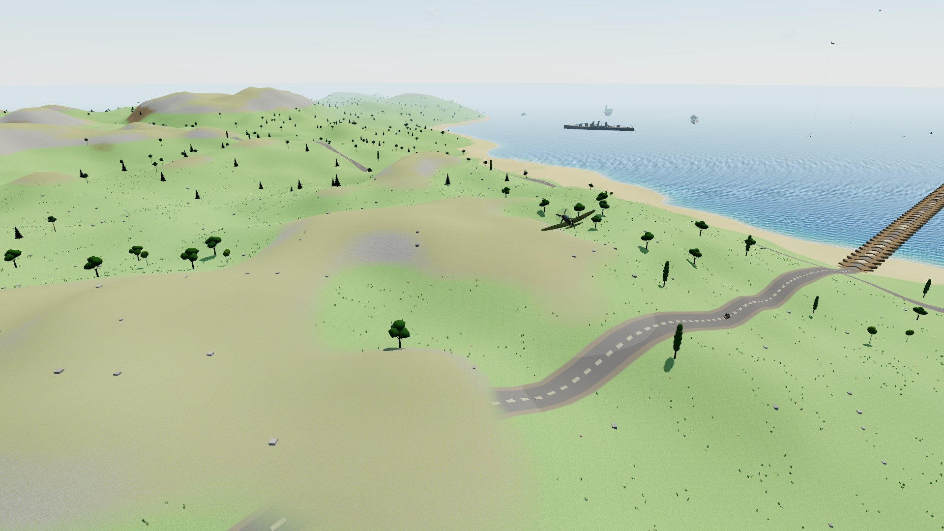 A crimson fighter banking low over rolling green hills, a paved road winding across them to a sandy beach, a timber bridge running out over the sea to a battleship at anchor